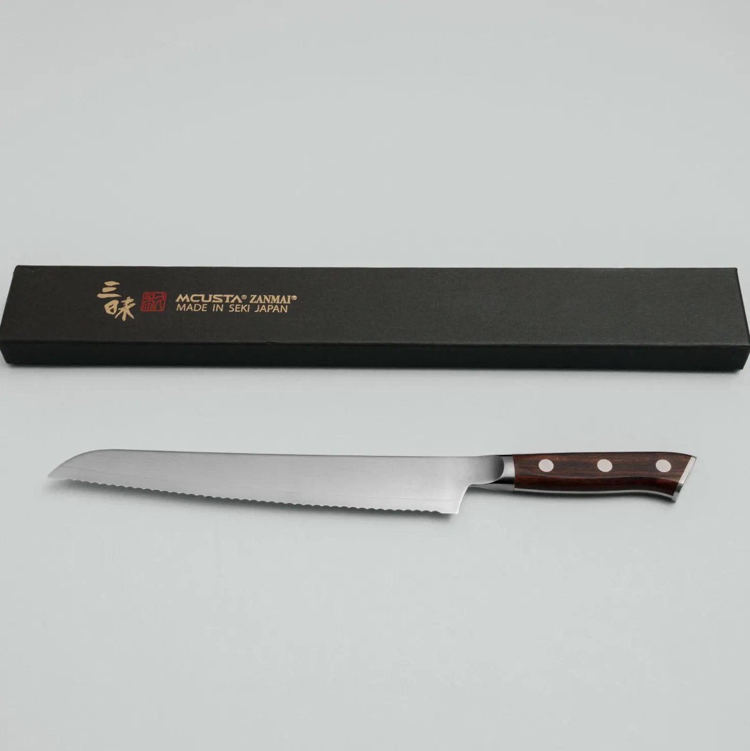 Mcusta Zanmai Premium Ironwood Broodmes 23 cm