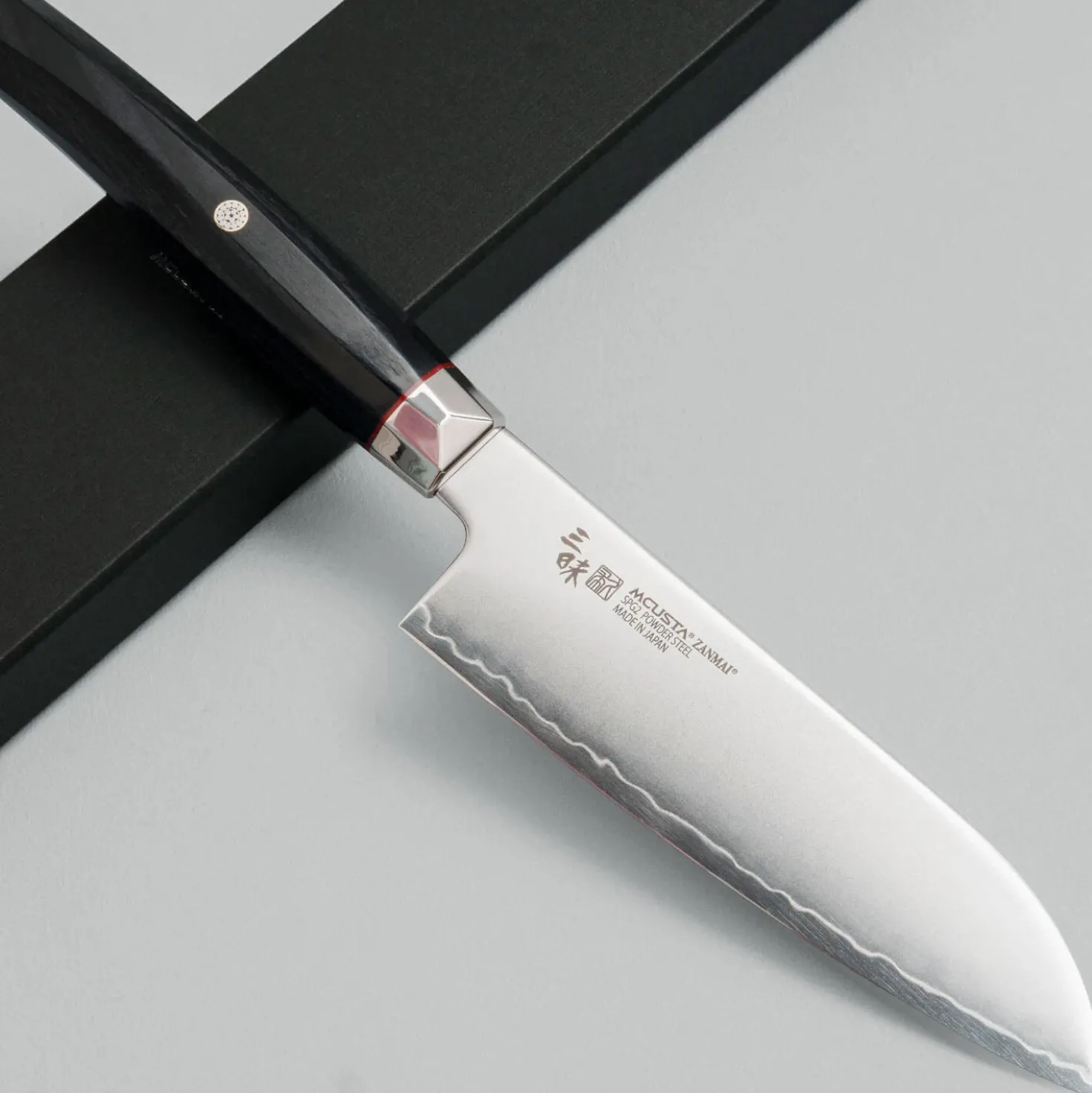 Mcusta Zanmai Revolution Black Santoku 15 cm