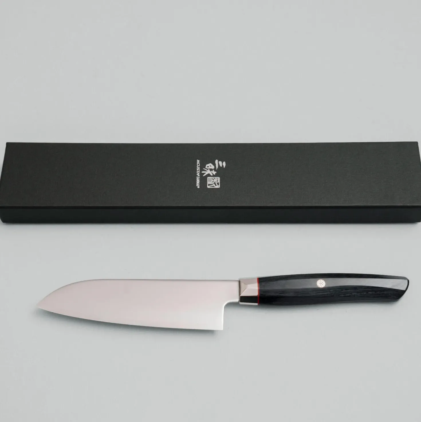 Mcusta Zanmai Revolution Black Santoku 15 cm