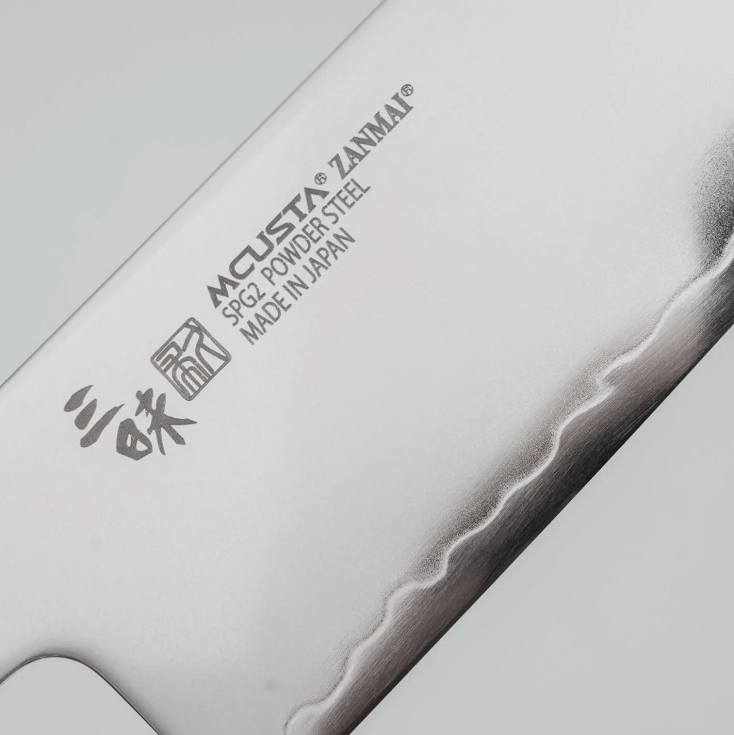 Mcusta Zanmai Revolution Black Santoku 15 cm